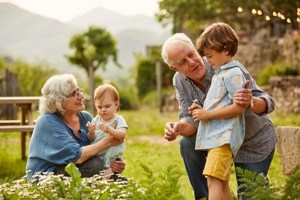 Person happily playing with grandchildren, symbolizing regained freedom.